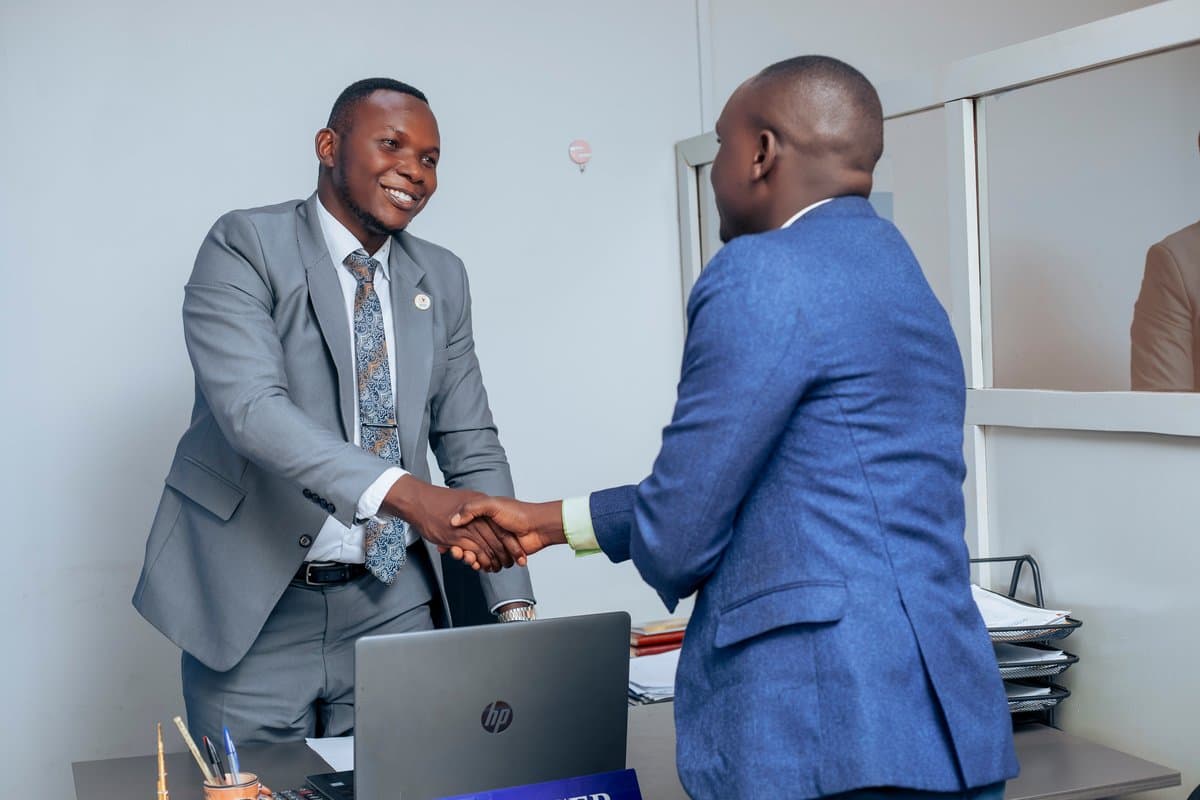 A Divine Credit Group loan officer with a client